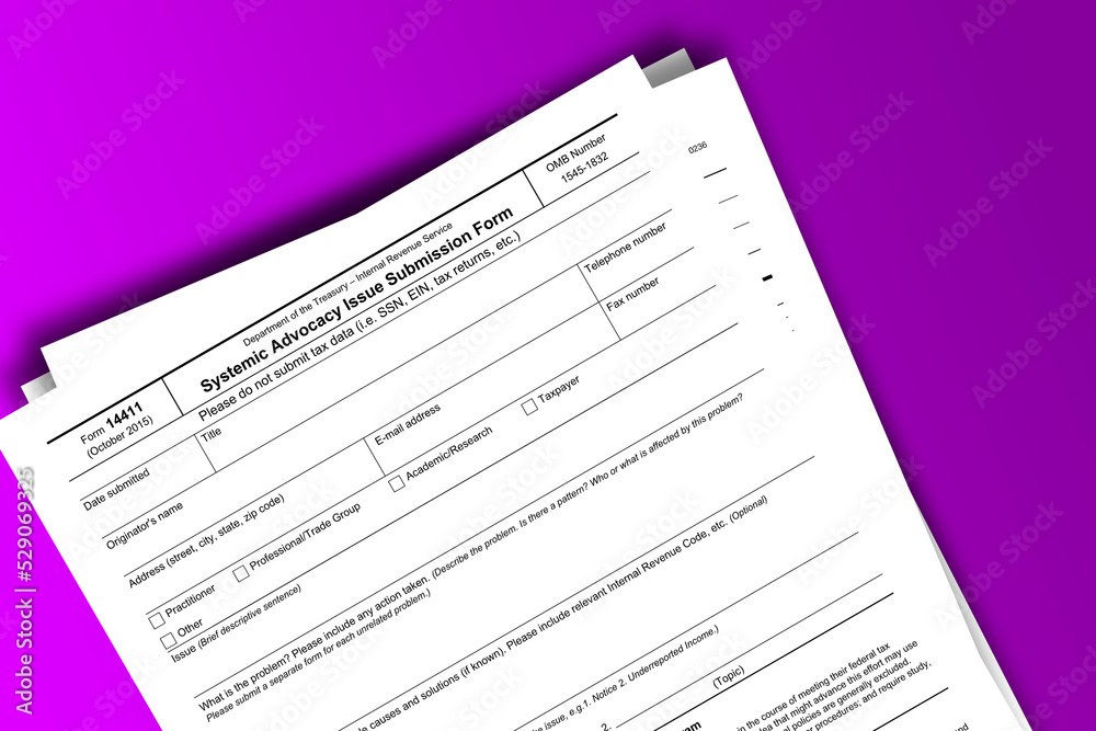 Form 14411 documentation published IRS USA 10.19.2015. American tax document on colored Form 14411 documentation published IRS USA 10.19.2015. American tax document on colored