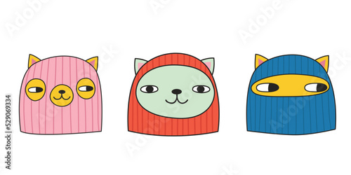 Cute cats in balaclavas. Doodle style. Vector illustration