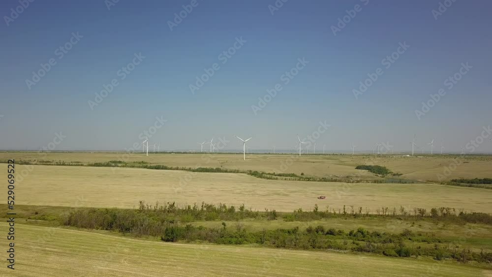 Renewable green energy, wind energy with windmills or wind turbine Renewable green energy, wind energy with windmills or wind turbine