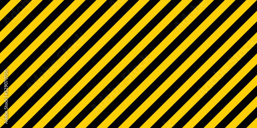 Yellow and black striped lines seamless pattern or texture. Under construction and safety background.