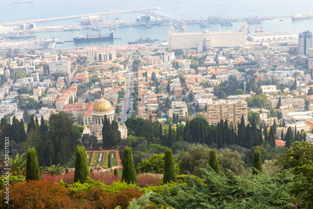 Haifa, Israel, June 26, 2022 : view from Louis Promenade on Mount Carmel to the Bahai Temple, the downtown and port of Haifa city in Israel