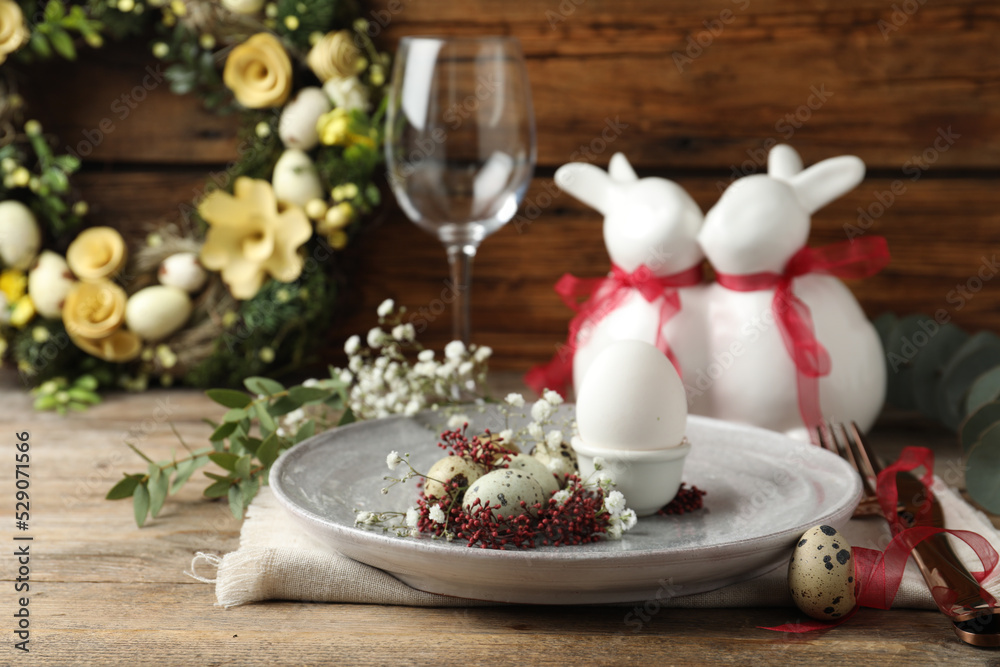 Festive Easter table setting with beautiful floral decor Festive Easter table setting with beautiful floral decor
