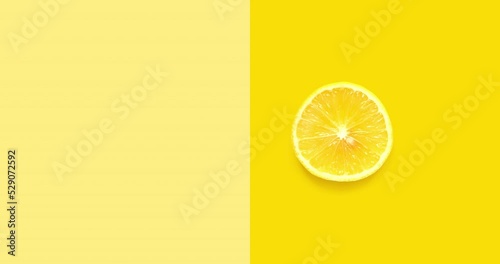 Creative animation made of lemon full an peeled on the yellow background. The concept of food.  photo