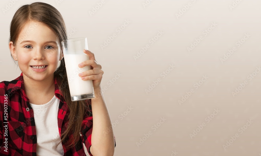 Image of happy girl child drinking milk on background Image of happy girl child drinking milk on background