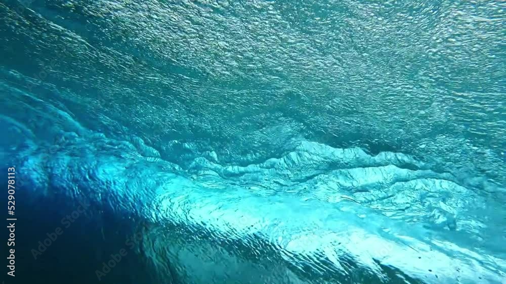Underwater Tahiti. Beautiful ocean wave, powerful wave breaking in slow