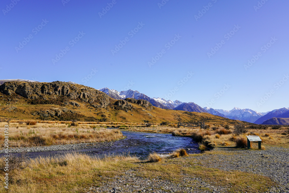 landscape with mountains, sky and river