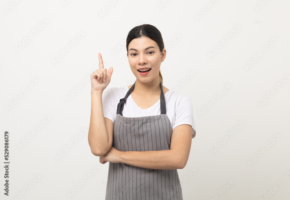 Young beautiful woman with apron standing thinking on isolated white background. Housekeeping housework or maid worker concept. Young beautiful woman with apron standing thinking on isolated white background. Housekeeping housework or maid worker concept.