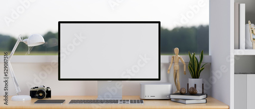 Minimal comfortable home working space with pc desktop computer mockup on wood table
