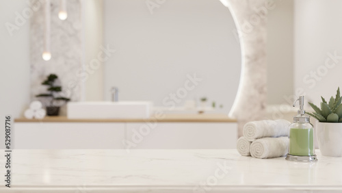 Photographie White luxury marble tabletop with copy space over blurred white elegance bathroo