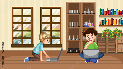 At home scene with two boys using their laptops