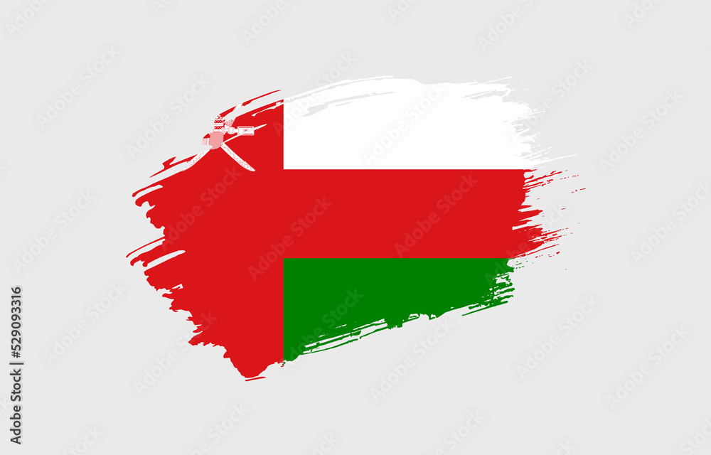 Creative hand drawn grunge brushed flag of Oman with solid background