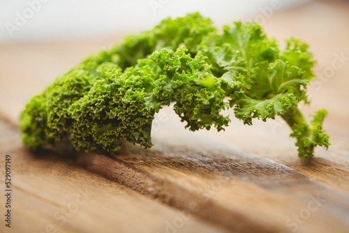 Parsley on wooden surface