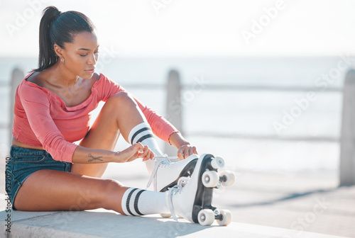 Wallpaper Mural Fitness, exercise and happy woman roller skating along a beach on a sunny day, content while prepare for workout outdoors