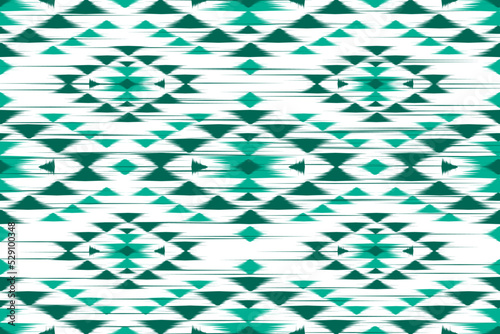 Fabric ethnic ikat pattern art. Geometric ethnic ikat seamless pattern in tribal. Design for background, wallpaper, illustration, fabric, clothing, carpet, textile, batik, embroidery.