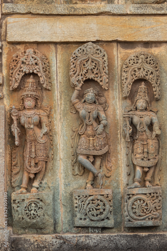 Depicting of  Hindu God and Goddess on the Chennakeshawa Temple, Belur,  It was commissioned by King Vishnuvardhana in 1117 CE, Hassan, Karnataka, India.