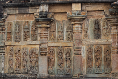 Depicting of  Hindu God and Goddess on the Chennakeshawa Temple, Belur,  It was commissioned by King Vishnuvardhana in 1117 CE, Hassan, Karnataka, India. photo