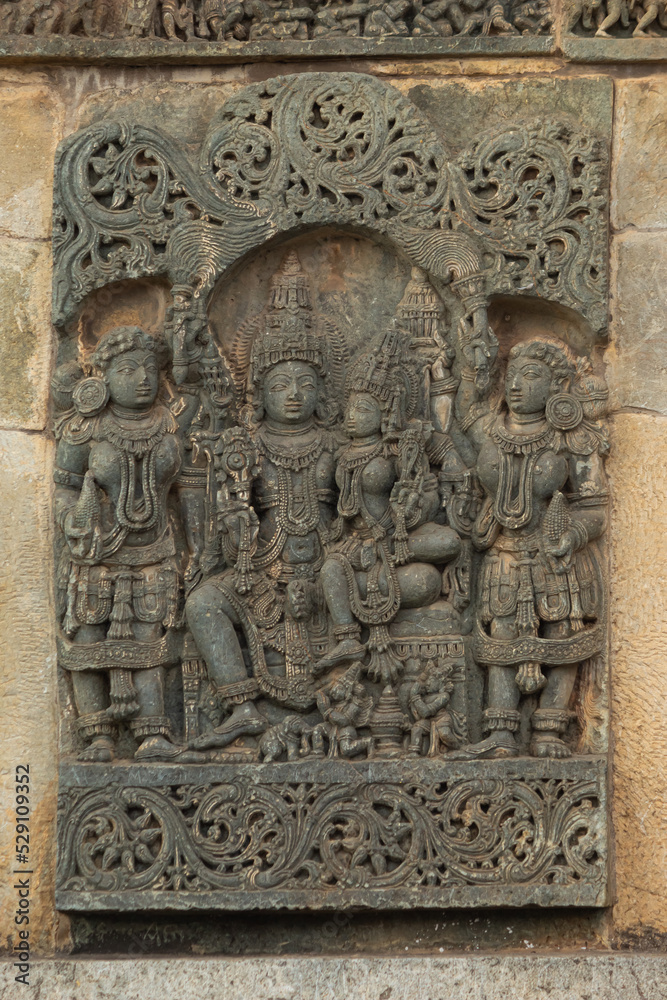 The Depicting of Lord Shiva and Parvati on the Chennakeshawa Temple, Belur,  It was commissioned by King Vishnuvardhana in 1117 CE, Hassan, Karnataka, India.