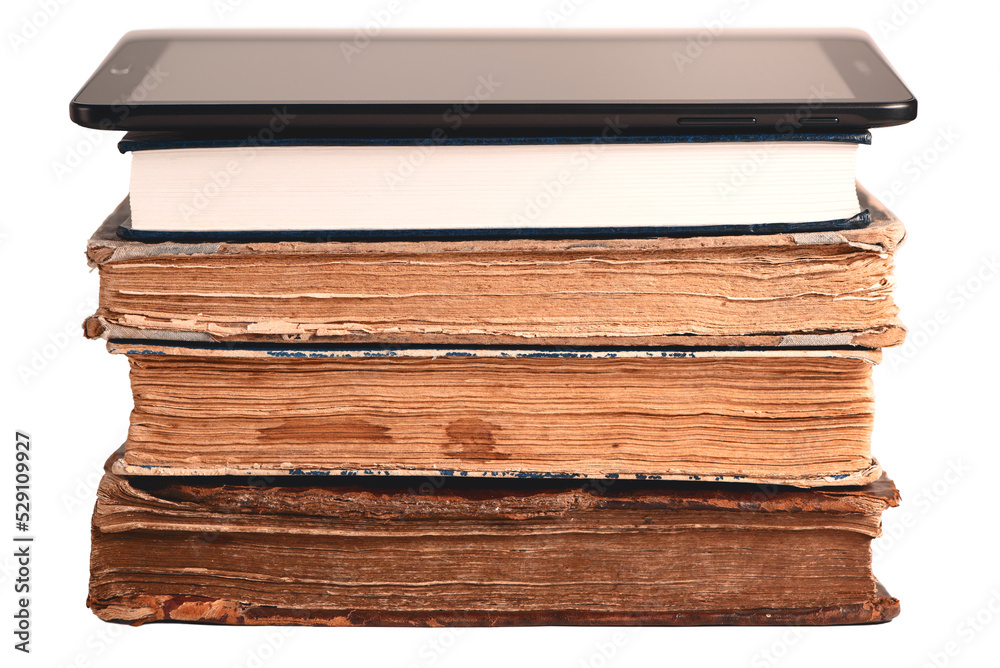 Stack of old and new books, digital tablet isolated on white. New technology concept. Choice between paper books and e-reader. Closeup.