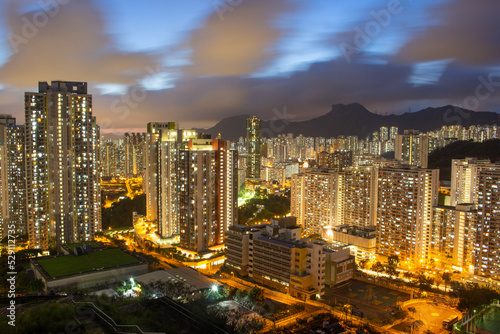 Night view at Ping Shan in Kowloon Bay  Hong Kong. Looking to the Lion Rock - famous landmark of Hong Kong. Long Exposure