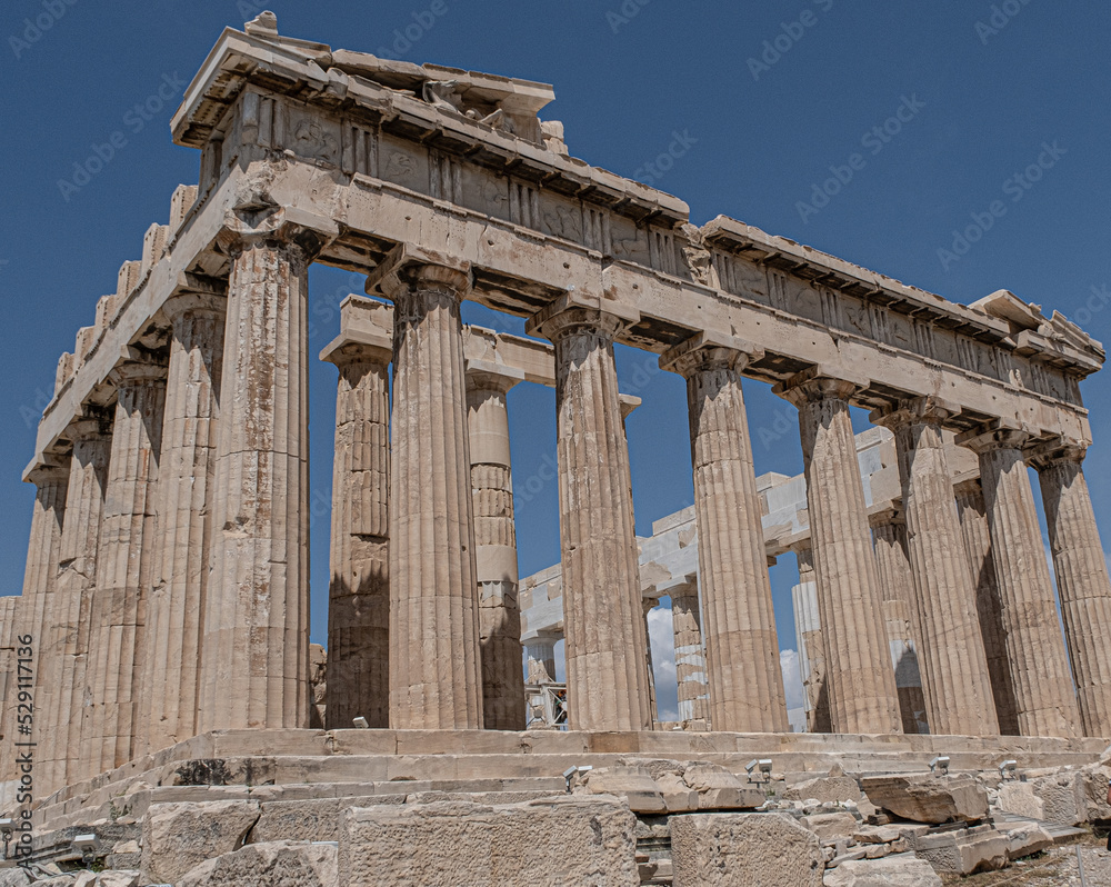 Obraz premium The Parthenon, the former temple on the Acropolis of Athens dedicated to the Goddess of Athena, the long lasting symbol of Ancient Greece, Athens, Greece
