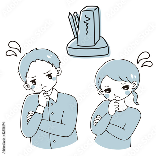 お墓について悩む若い男性と女性