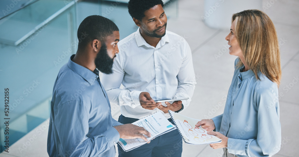 Obraz premium Business people planning with document and tablet, meeting about financial paper and talking about company growth in office at work. Finance employees in accounting working on strategy as team
