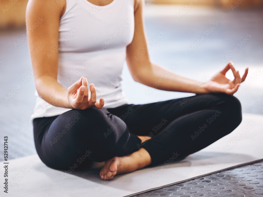 Meditation, wellness and zen woman doing yoga, pilates or meditate for spiritual energy, mind and mindset health. Mindfulness, lotus and a girl sitting on floor to relax, peace and breathing exercise