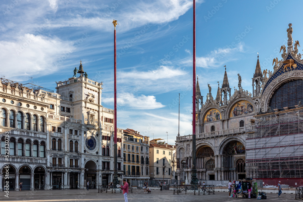 Piazza san marco square with Patriarchal Cathedral Basilica of Saint Mark and St Mark's bell tower (Campanile di San Marco) in Venice, Italy 