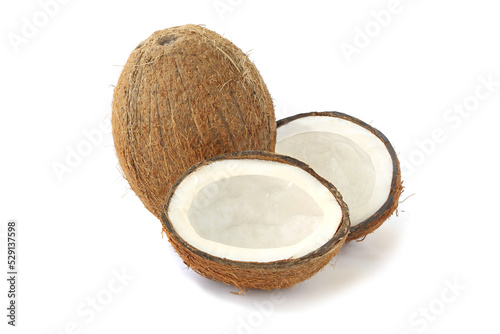 Tasty coconut and two halfs isolated on white