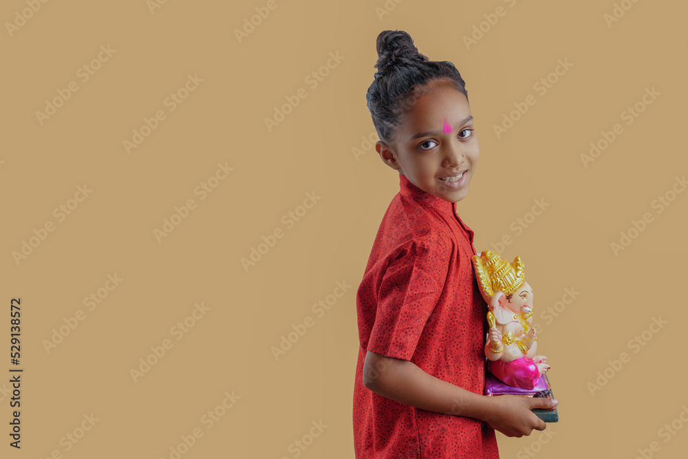 Little Indian child with lord ganesha Little Indian child with lord ganesha