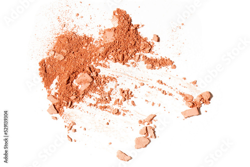 Crushed pink coral eyeshadow swatch isolated on white background. Abstract sample of pink cosmetic clay  blush or eye shadow  beauty make up cosmetics texture products.