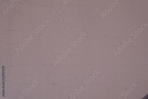 Old cracked brownish pink painted wall texture