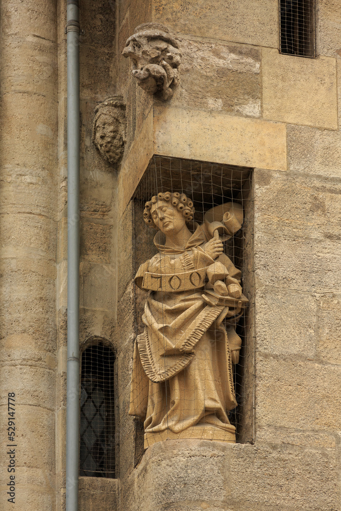 Decorative detail of the exterior of Gothic architecture. Sculpture in the wall of St. Stephen's Catholic Cathedral in Vienna. Close-up frontal view