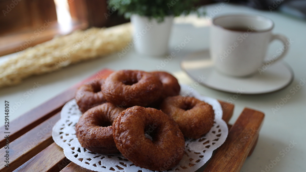 Kue cincin often called Kue Donut, or Ali Agrem is a cake made from brown sugar mixed with sago. Kue cincin often called Kue Donut, or Ali Agrem is a cake made from brown sugar mixed with sago.