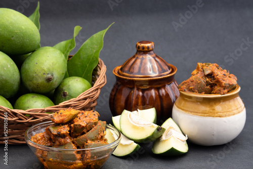 Mango Pickle Also Called Aam Ka Achar, Sookha Kairi, Chatpata Loncha Is Made of Unpeeled Raw Green Mango Cut Mixed With Spices - Garlic, Masala, Red Chilli, Salt, Turmeric, Sarson, Mustard, Sarso Oil