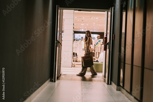 Teenage girl with shopping bags