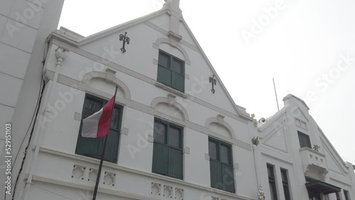 facade of a building with a flag