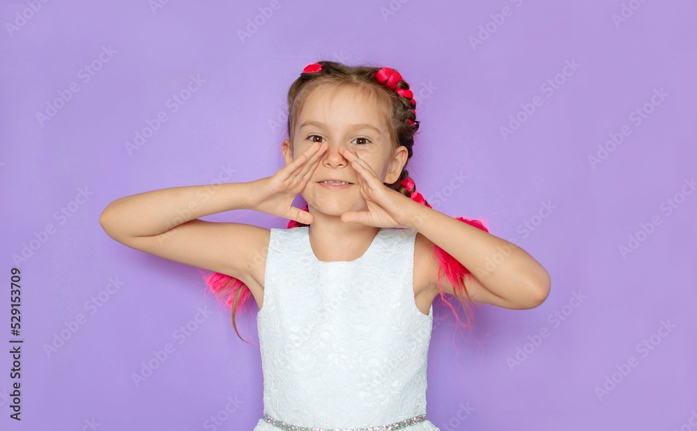 Sale, discount, win, winner's concept. An impressed, happy, cute girl with pink hair looks into the camera with her mouth open and screams against purple background. Advertising of a children's store Sale, discount, win, winner's concept. An impressed, happy, cute girl with pink hair looks into the camera with her mouth open and screams against purple background. Advertising of a children's store