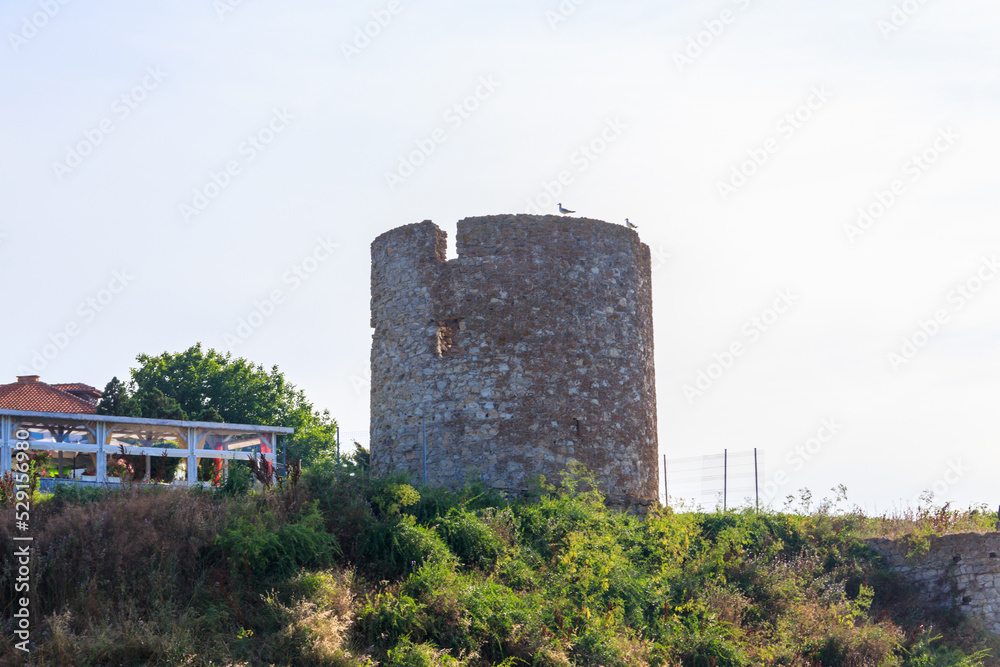 Ancient ruins of old windmill in old town of Nessebar, Bulgaria Ancient ruins of old windmill in old town of Nessebar, Bulgaria