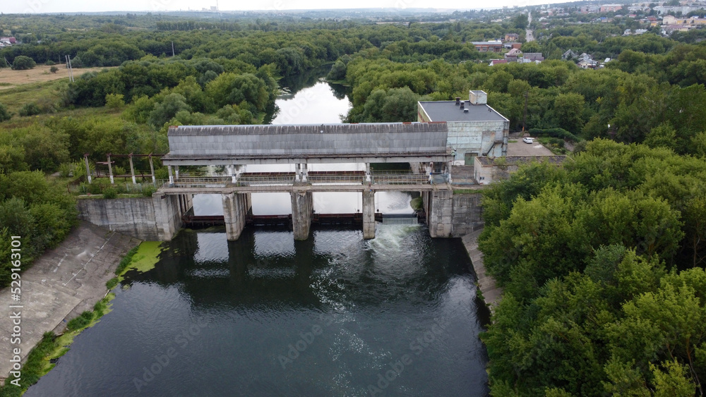 Fototapeta premium View of a dam on a small river.