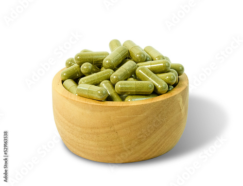 Kratom (Mitragyna speciosa) capsules  isolated on a white background and Clipping Path.