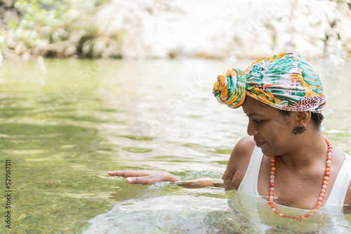 Fototapeta Naklejka Na Ścianę i Meble -  Woman Swimming In The River.