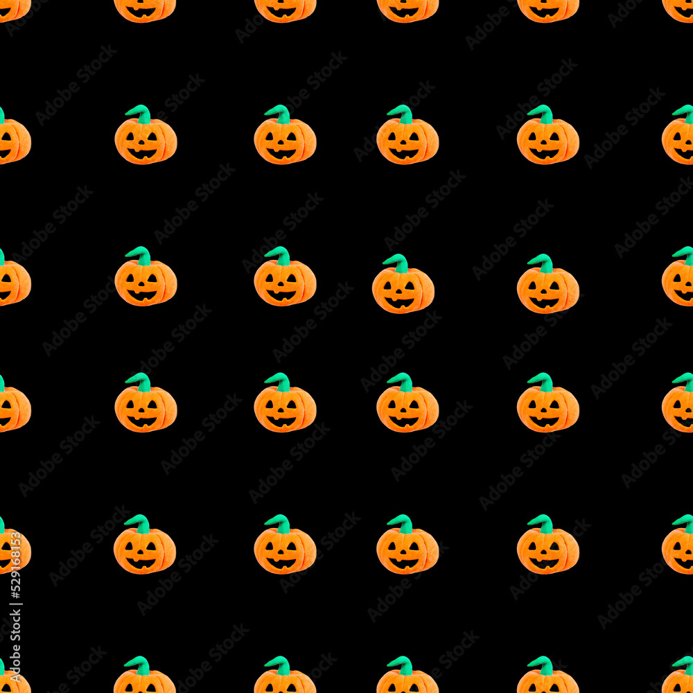 seamless pattern. funny pumpkins on black background seamless pattern. funny pumpkins on black background