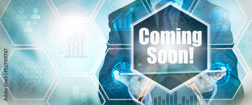 Obraz na płótnie A Coming Soon business word concept on a futuristic blue display. w salonie