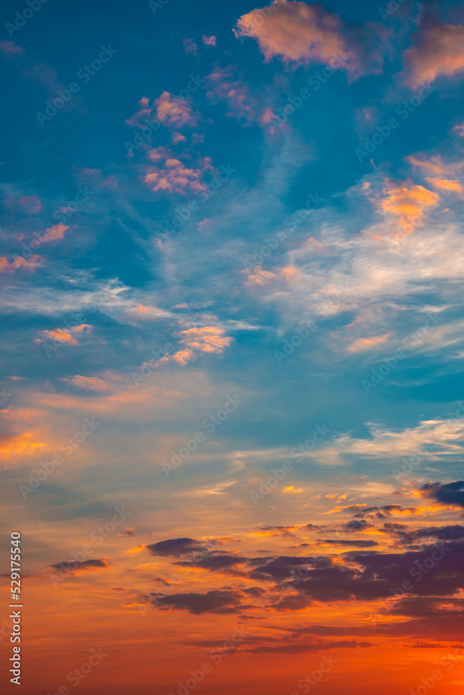 Cover page with deep orange sky, illuminated clouds at bloody sunset as a background.
