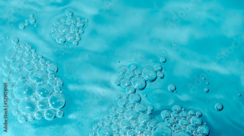 Water bubbles on blue turquoise background