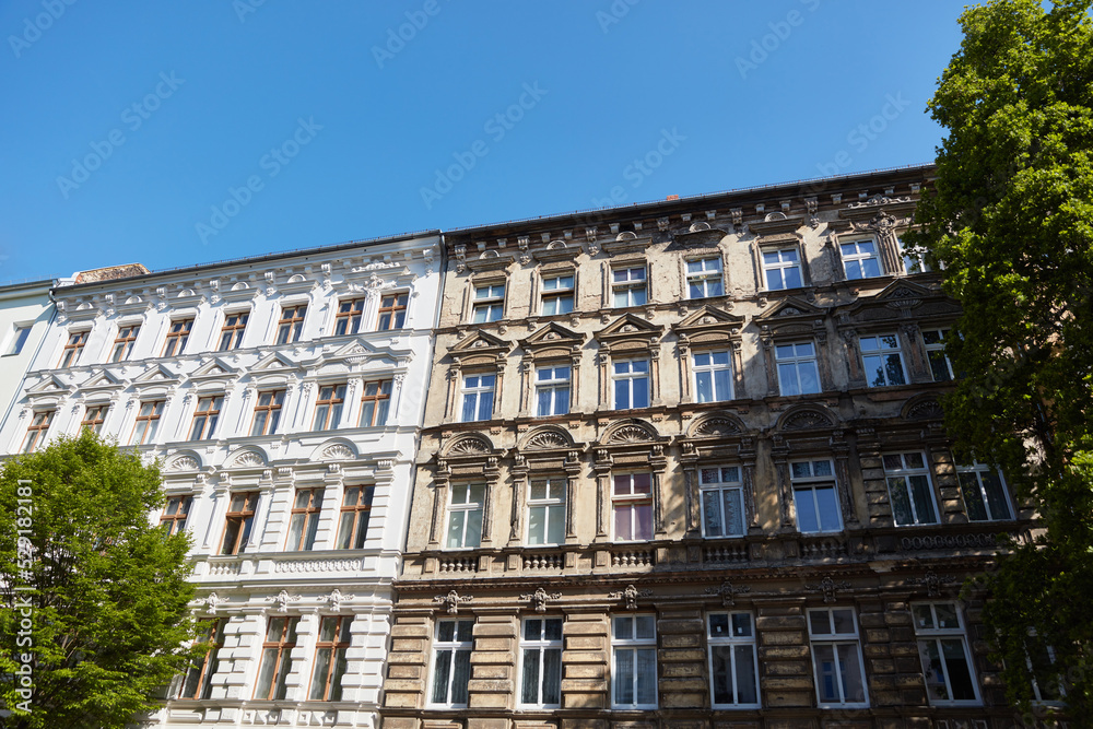 Comparison of old building facade before and after renovation