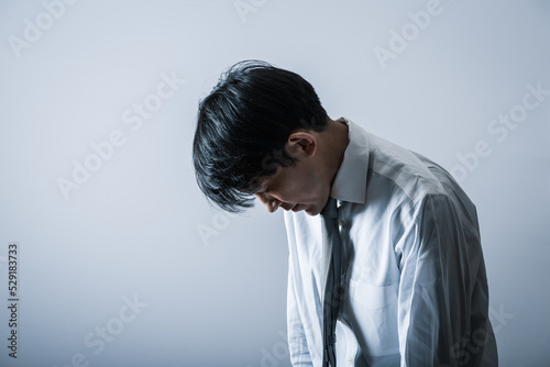 Photos 落ち込むビジネスマン