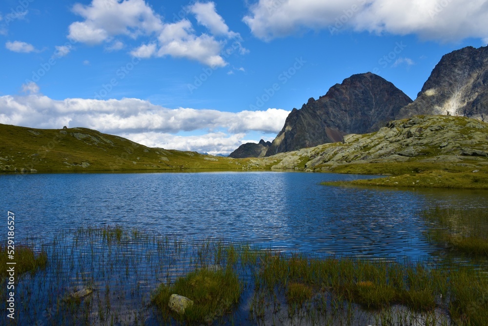 Lake in Gradental valley with the peak of Georgskopf mountain in Schober group sub-range of Hohe Tauern in Central Eastern Alps, Carinthia, Austria