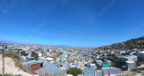 Over looking khayelitsha growing township with Table mountain in the background.  photo